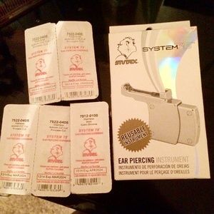 Brand new piercing gun with earrings