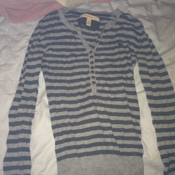 Long dark grey and light grey striped shirt.