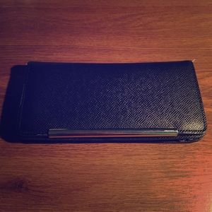Ivanka Trump black zip around saffiano wallet