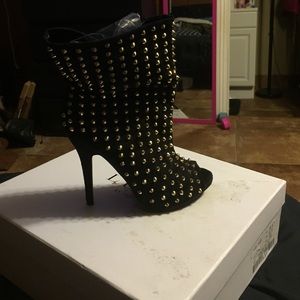 Black and gold studded booties just fab