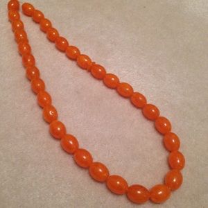 Vintage long orange beaded necklace