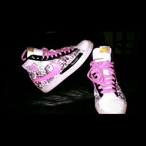Nike pink and white basketball shoes