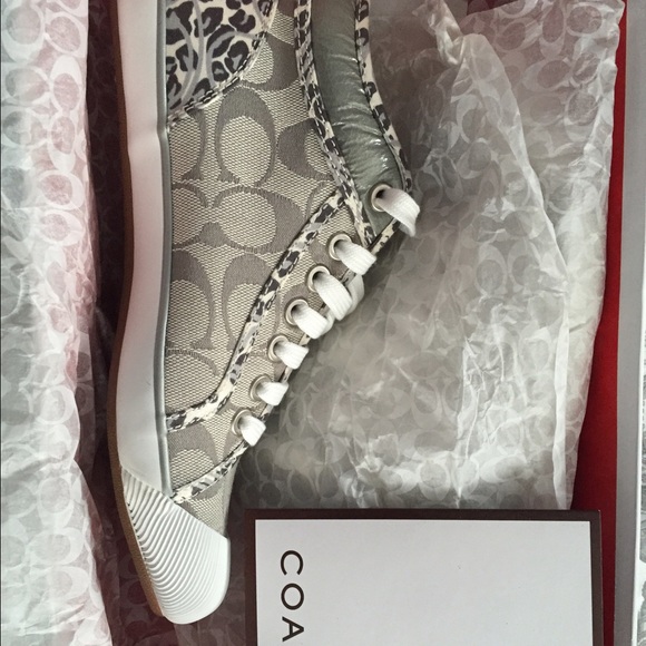 *Brand New in box Coach sneakers. Leopard detail.