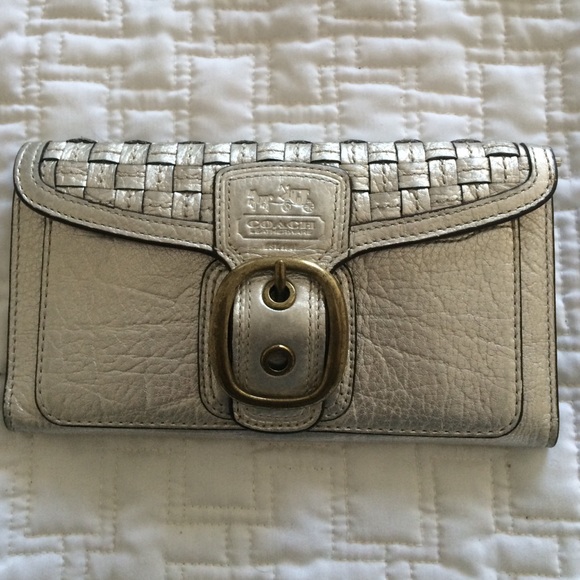 Coach silver metallic wallet.