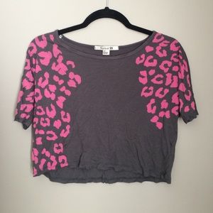 Grey crop top with pink cheetah pattern.