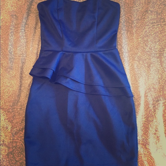 Dark blue body con dress with peplum