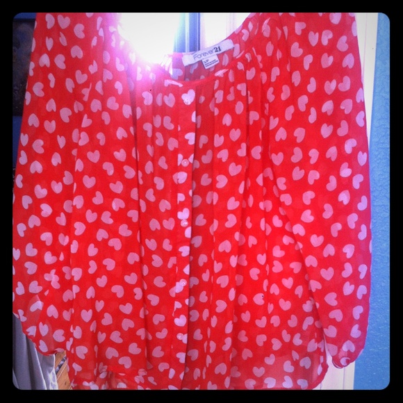 light red with white hearts shirt