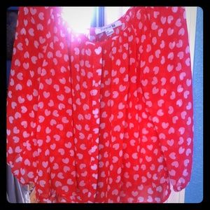 light red with white hearts shirt