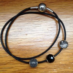 Pandora Essence bracelet with three charms