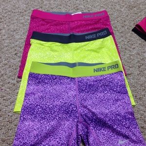3 pairs of Nike pros