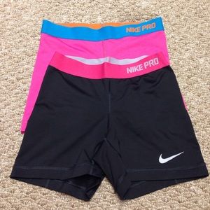 2 pairs of Nike pros