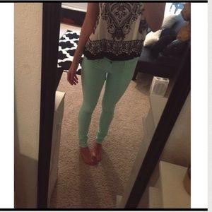 Mint green skinny jeans