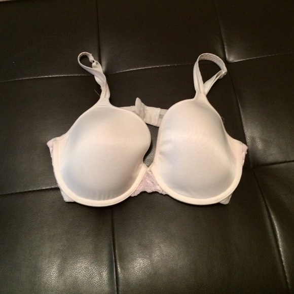 Cream colored bra with pink lace
