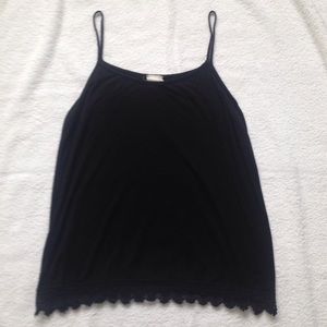 XL kids spaghetti strap top with lace trim.