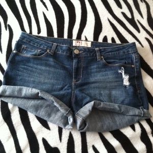 Distressed denim shorts