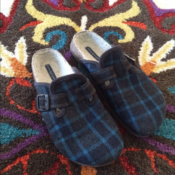 Teal and black clogs