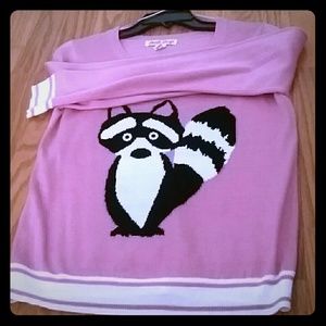 A pink Love By Design sweat shirt
