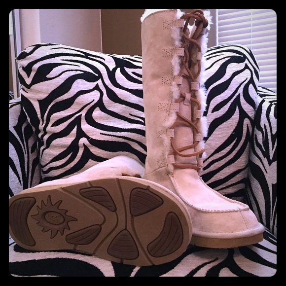 Lace up uggs. Size 7. Never worn.