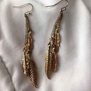 Gold feather earrings