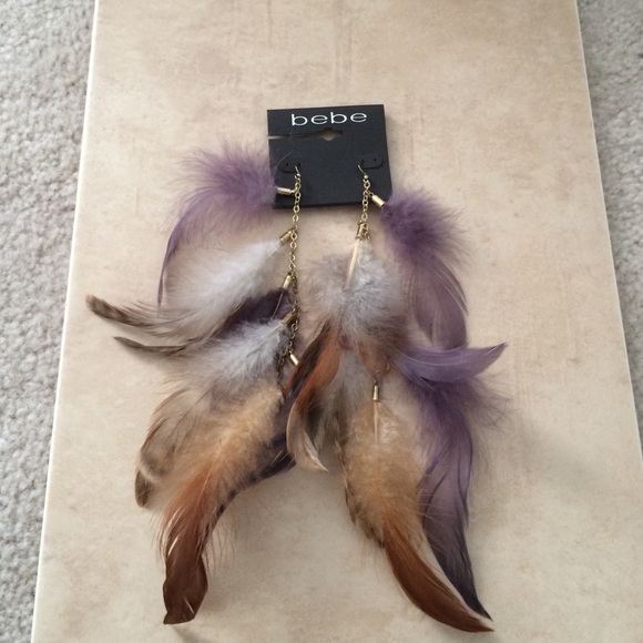 bebe Jewelry - Bebe purple/tan feathered earrings