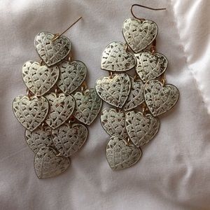 Rustic white heart dangly earrings.