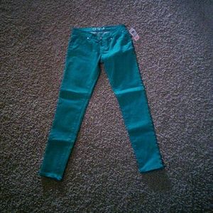 Green skinny jeans