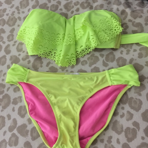 Neon green Jessica Simpson bikini. Laser cut top
