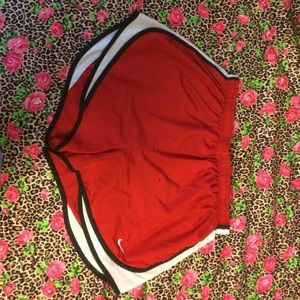 Red black and white Nike shorts