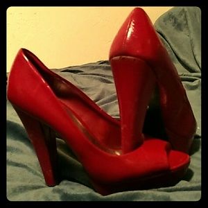 Red peep toe platform heels