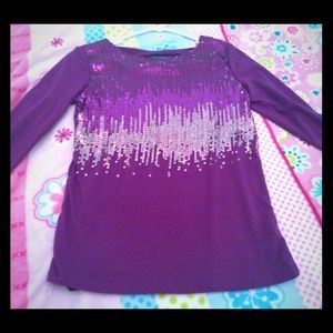 A purple long sleeve