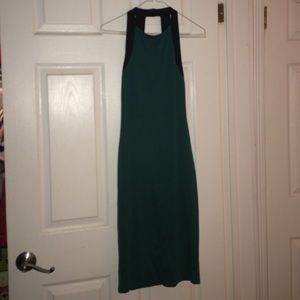 Green Knee Length Dress with Black Trim.