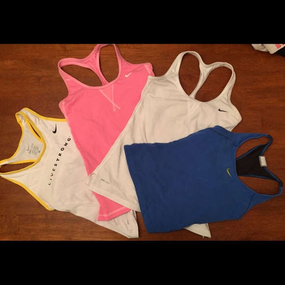 Nike bundle- 4 Dri-Fit tanks with built in bra