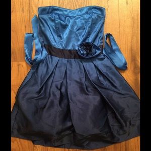 A blue cocktail party dress.