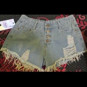 Ripped cut out light denim jean distressed shorts