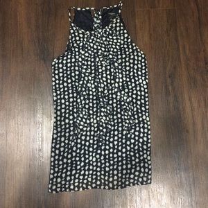 Ann Taylor black and white ruffle blouse.