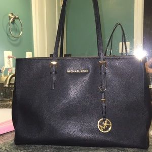 Authentic Jet Set lg travel tote black saffiano.