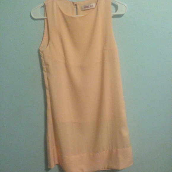 She inside light pink shift dress
