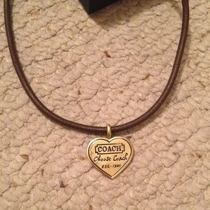 Brown coach necklace
