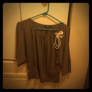 Blouse with attached bow