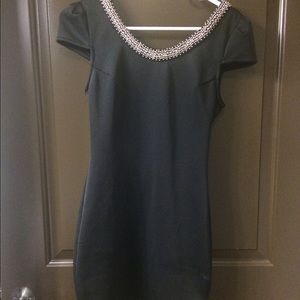 Short black cocktail dress, beading and low back