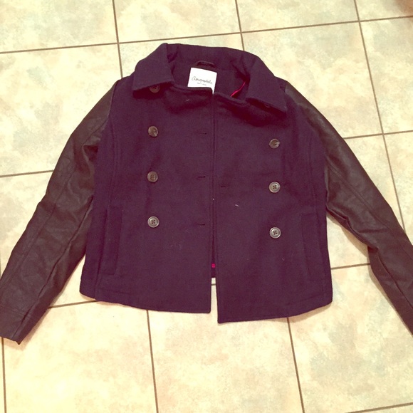 Navy blue jacket with leather arms