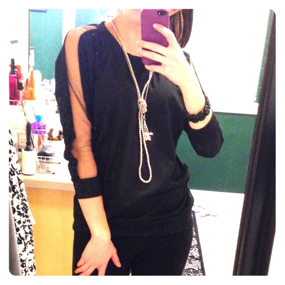 Peekaboo sleeve detail top