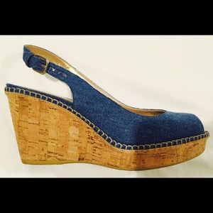 Stuart Weitzman "Jean" sandal wedges w/ cork heel.