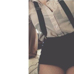 Suspenders with high wasted shorts.