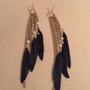 Gold feathered earrings