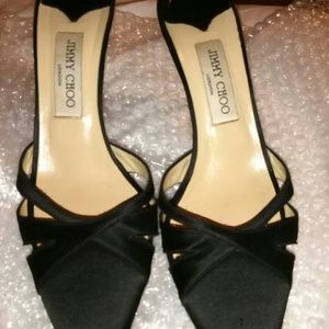 Black satin pumps