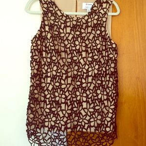 Beige tank with floral overlay