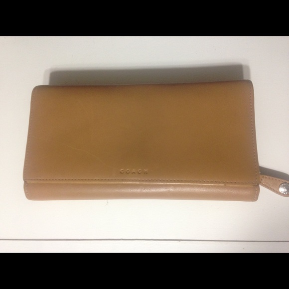 Tan leather Coach wallet.