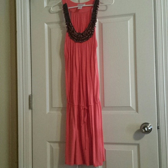 Cute coral dress with beads on neckline