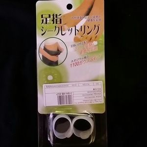 Magnetic weight loss toe rings